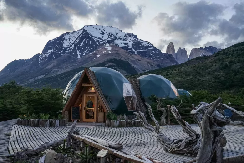 Glamping site with snow mountains