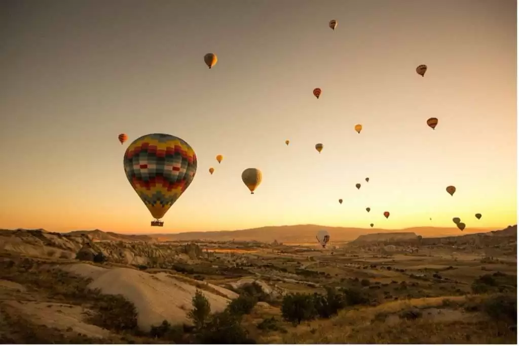 Hot air balloon with a sun set in Cappadocia