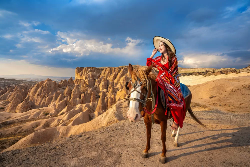 A girl doing horse back ride in Cappadocia